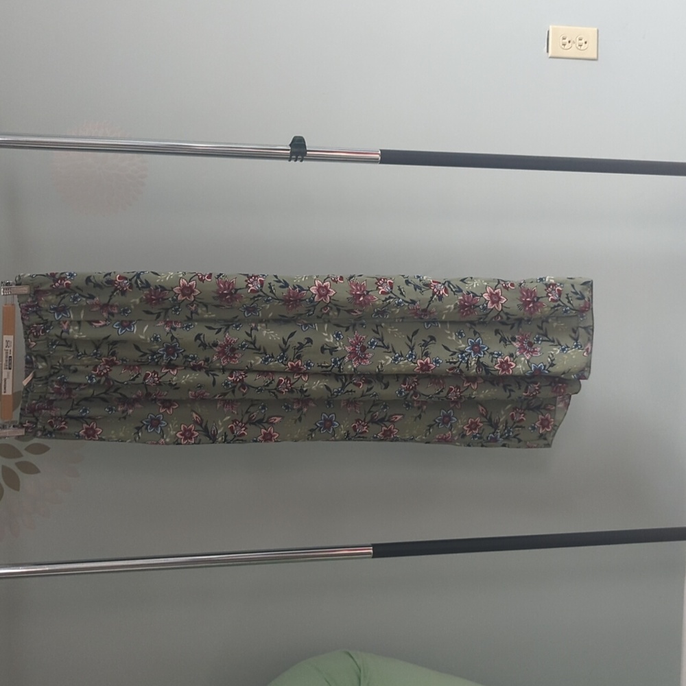Long pants with slits long enough to make shorts green floral pattern